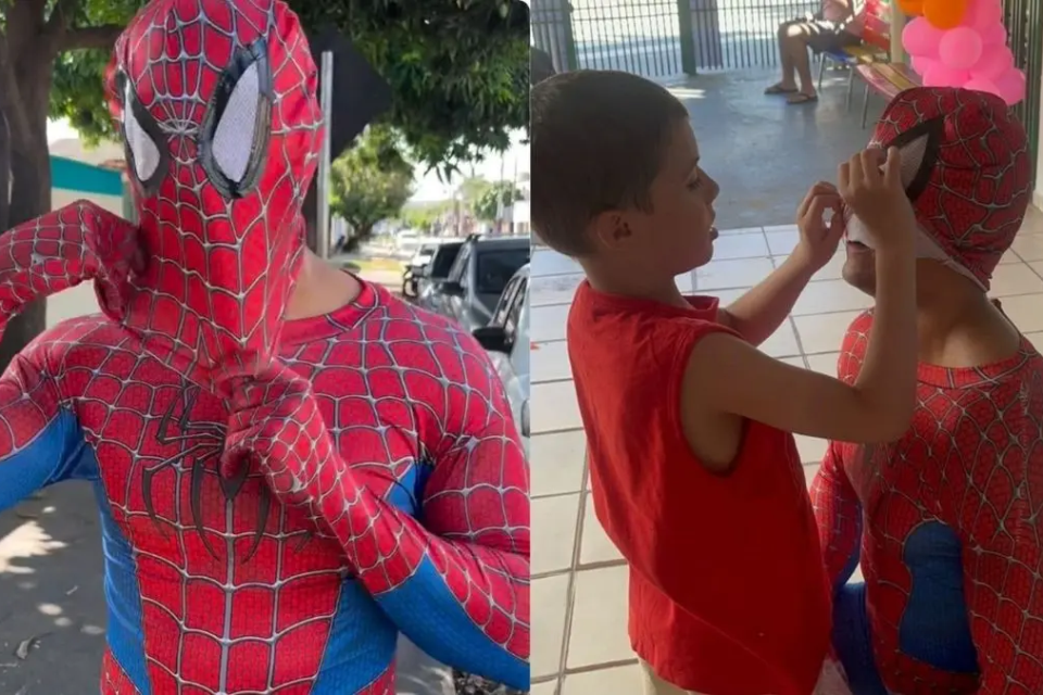 Homem vestido de Homem-Aranha durante surpresa para crianças em escola de Senador Canedo