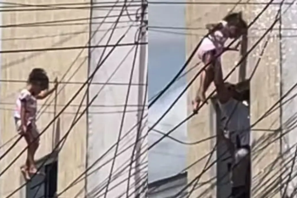 criança presa na fiação elétrica